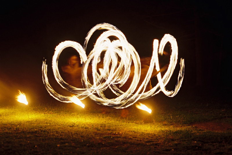 Loki spins fire poi
